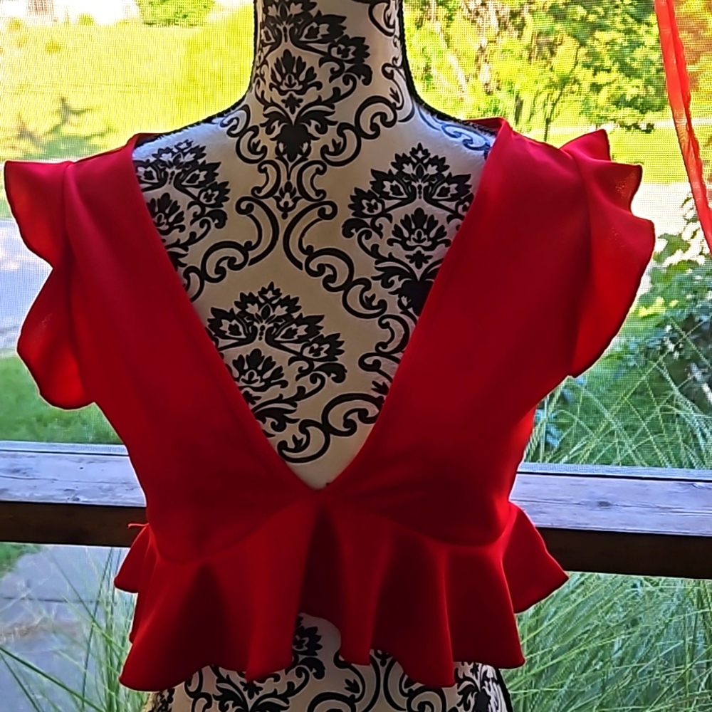 Cute red top.